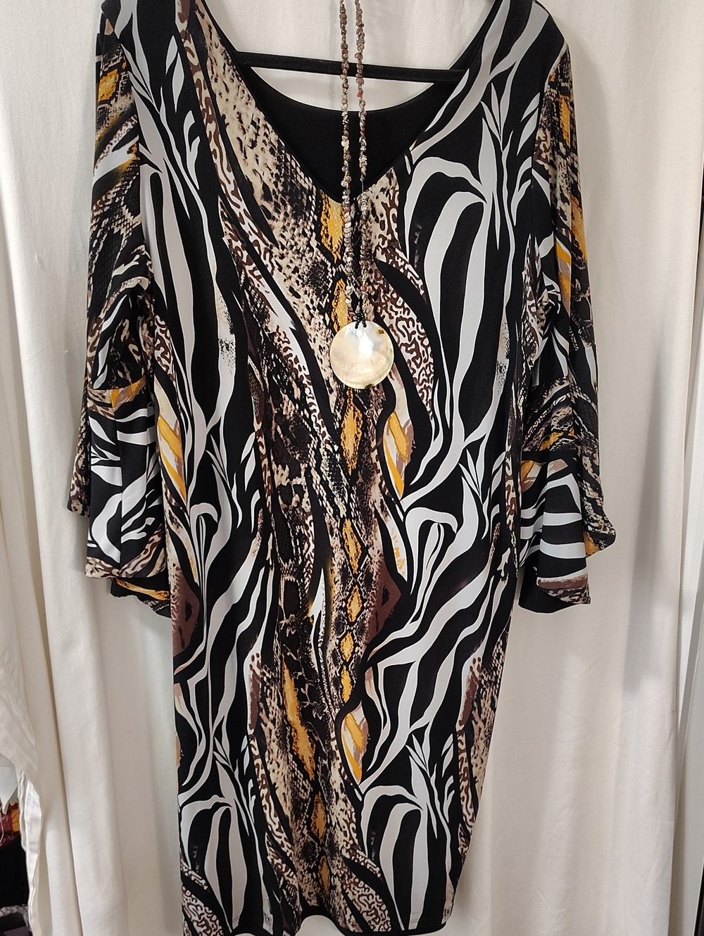 Women's Black & White Abstract Print Tunic with Gold Accents